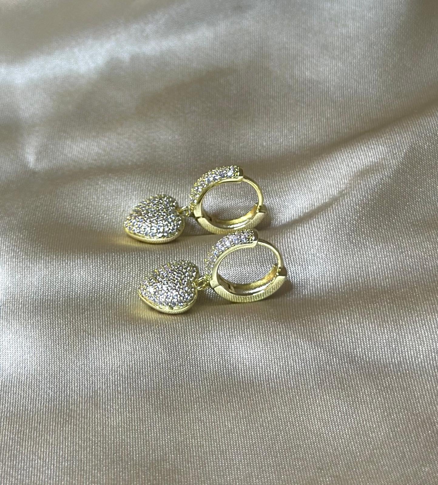 Dangling Amor Huggie Earrings